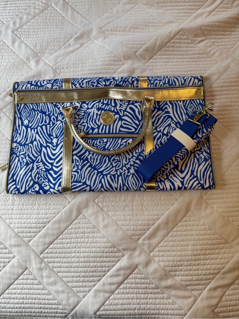 Lilly Pulitzer Blue and White Patterned Garment Duffle Bag with Gold Accents